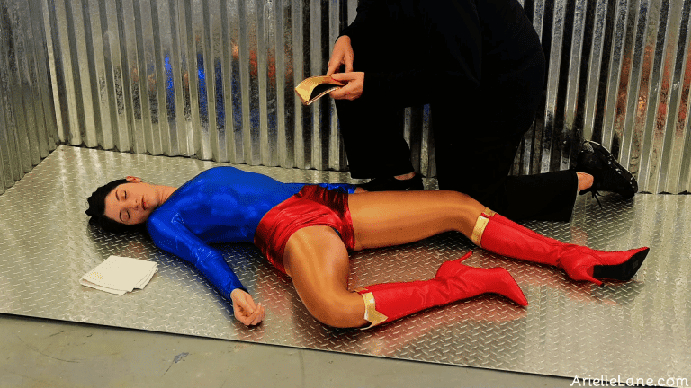 screencaps from “UltraGirl Ambushed, Hogtied, and Gagged” – Featuring Arielle Lane
